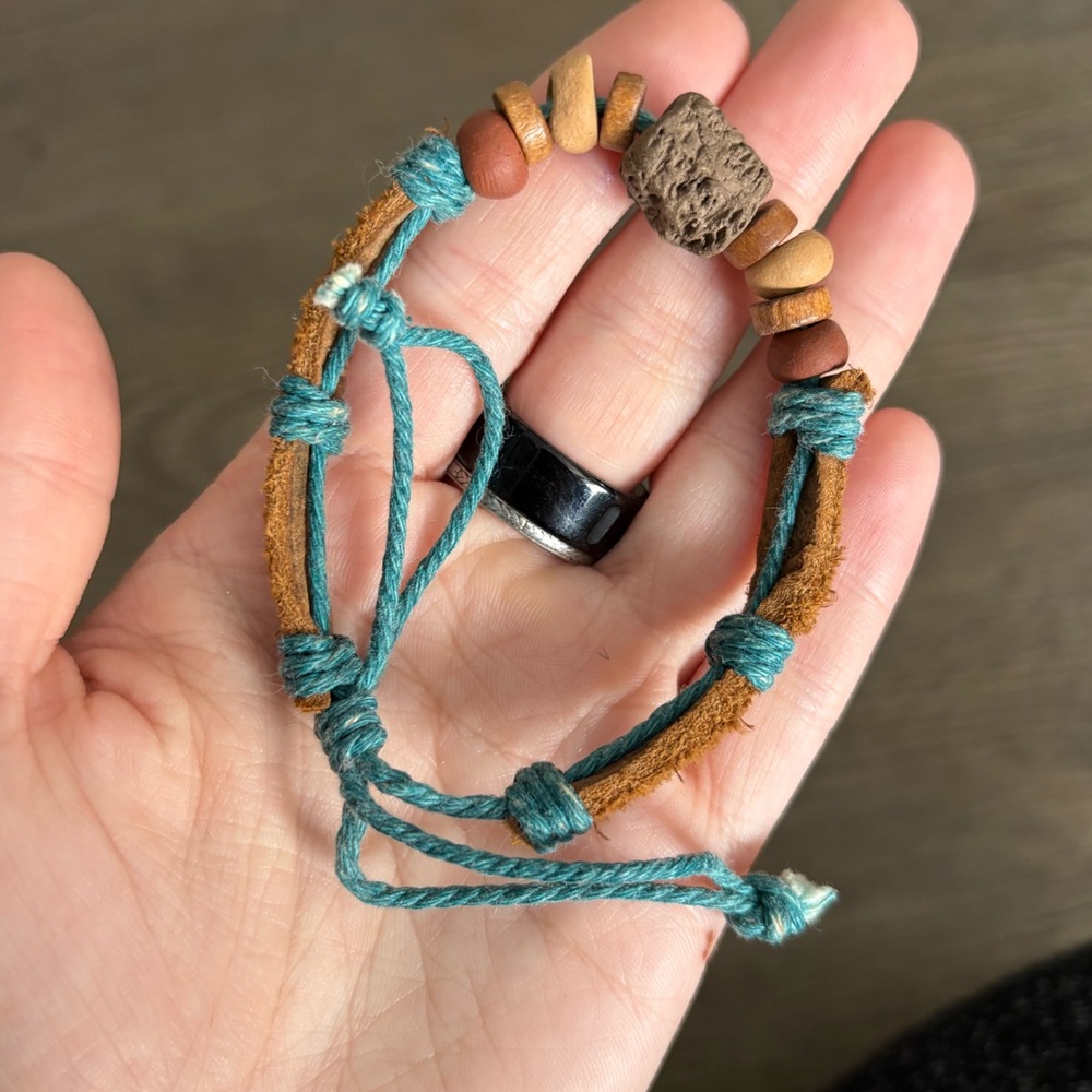 LEATHER AND LAVA BEAD ADJUSTABLE BRACELET